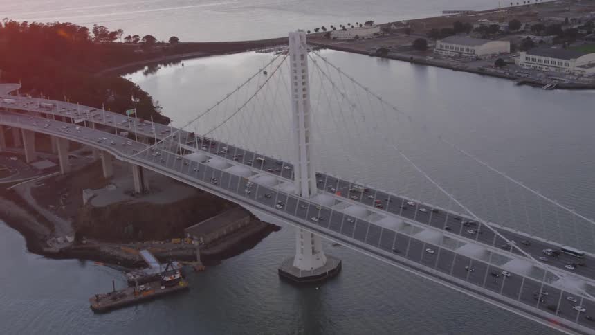 Aerial view of a large bridge over a harbor