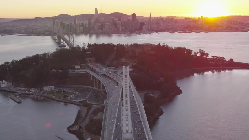 Aerial view of a bridge going over an island