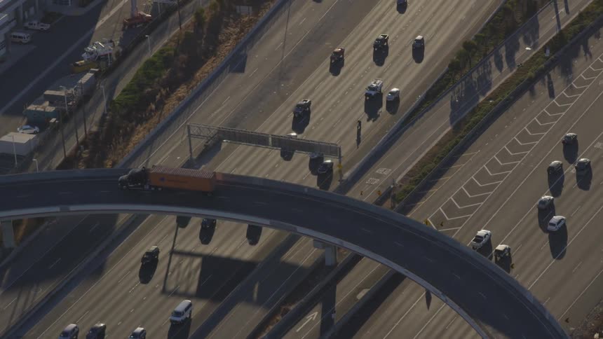 Light traffic drives down a very large highway