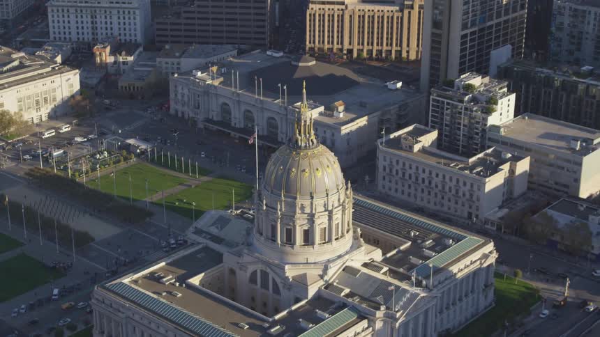 Downtown city streets and buildings including a large domed building