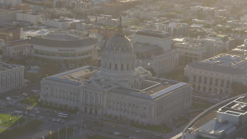 Capitol building is viewed from the air at sunset