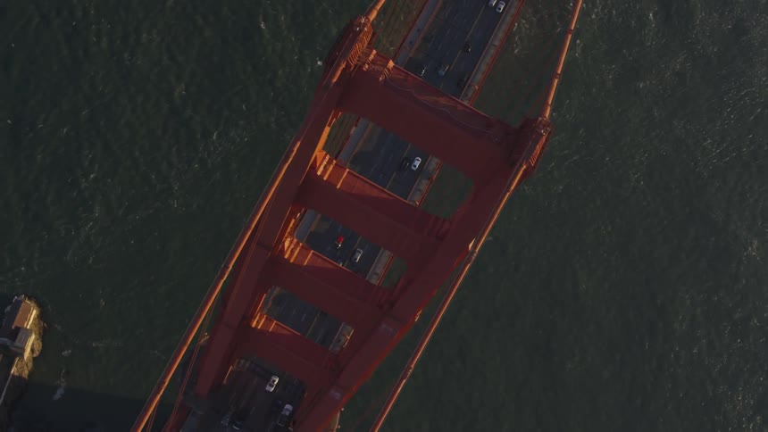 Cars drive over the golden gate bridge in san francisco