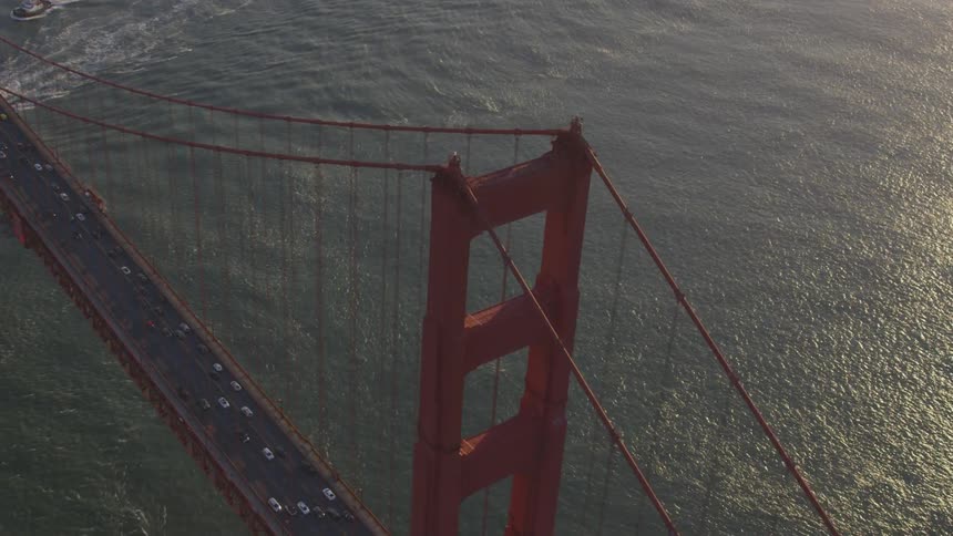 Cars driving across the golden gate bridge