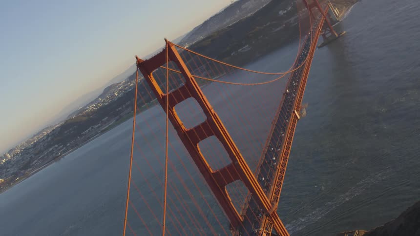 Cars are driving over on a bridge
