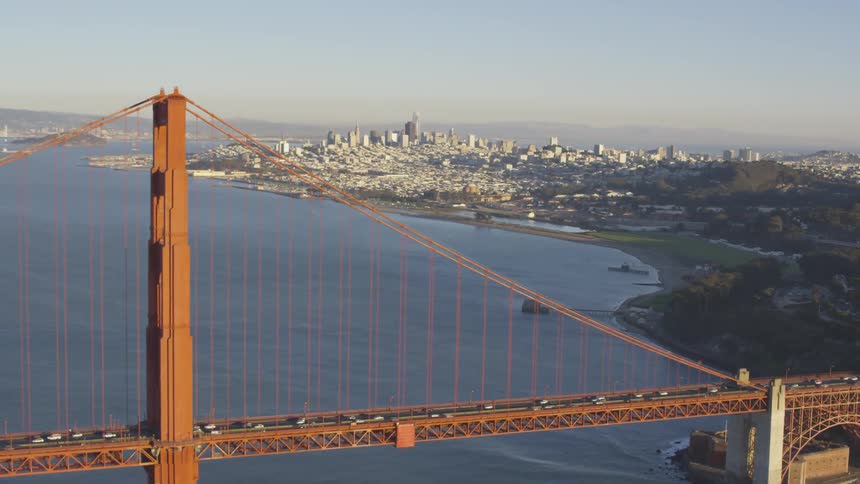 Golden gate bridge with cars going across it