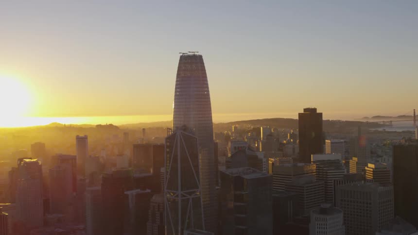 Aerial skyline of a large city during sunrise