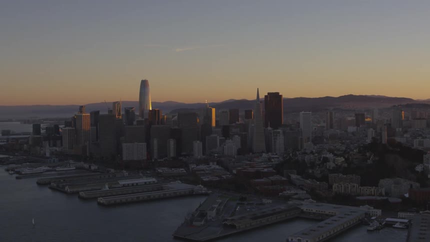 An aerial view of city's skyline at dawn