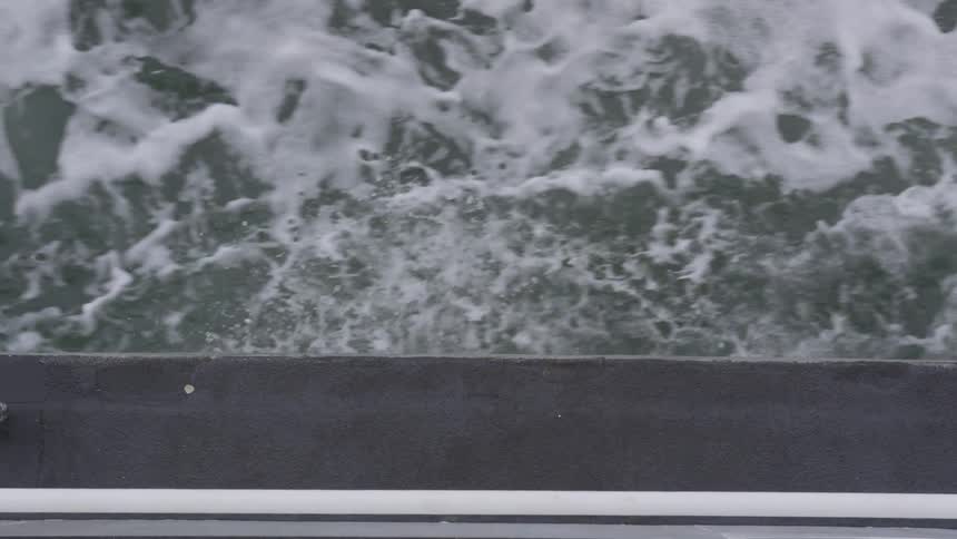 A top down view of water rushing by