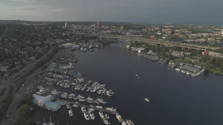 An aerial view of a city's canal on a cloudy day