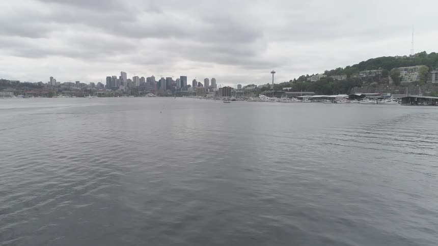 A city coastline and harbor on a cloudy day