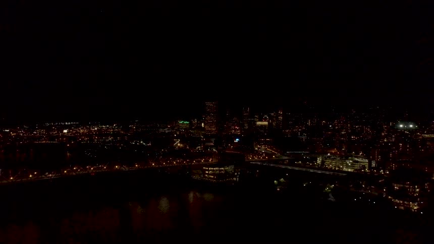 The buildings are lit up at night