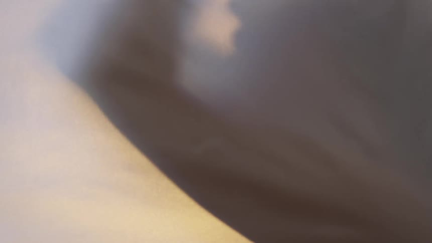 A woman running her hands through her hair