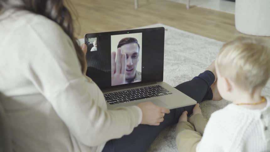 A toddler participating in a video call