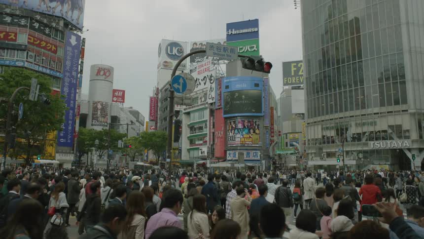 Crowd of people walking in a busy city