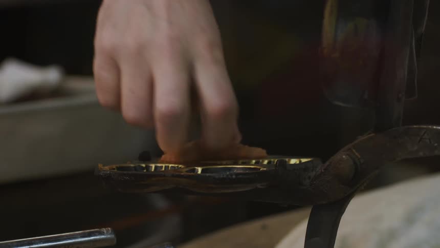Food being removed from a cooking tool