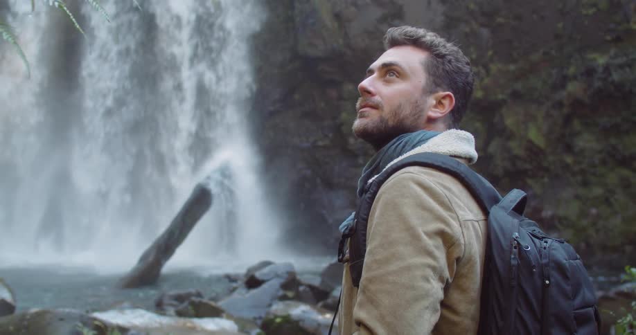 Man Exploring Waterfall