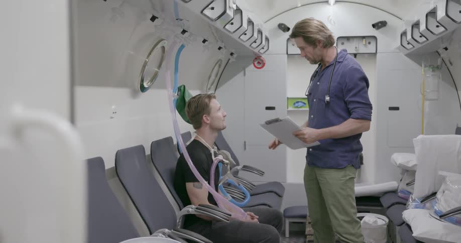 Physician goes over notes with a patient