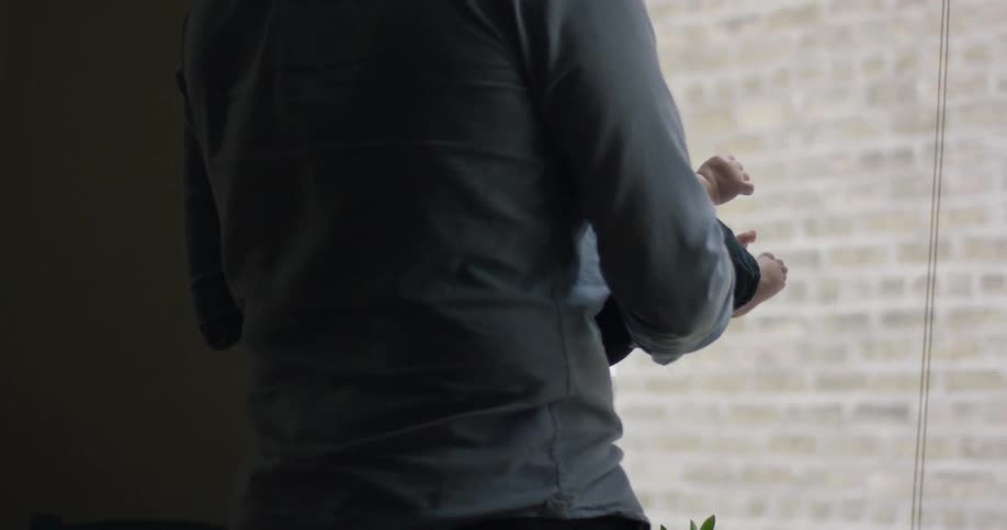 An adult holding a child