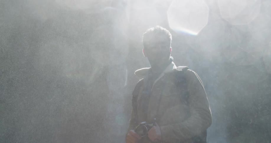 Man Exploring Waterfall