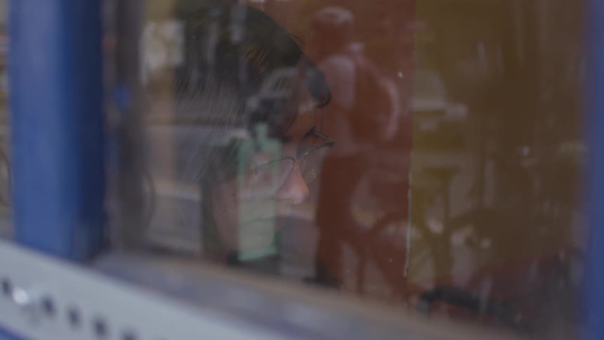 Reflection of people in windows