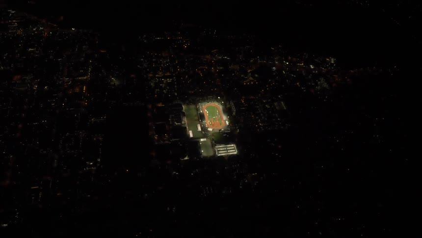 Aerial view of an athletic complex at night