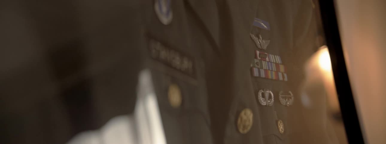 An army uniform is displayed