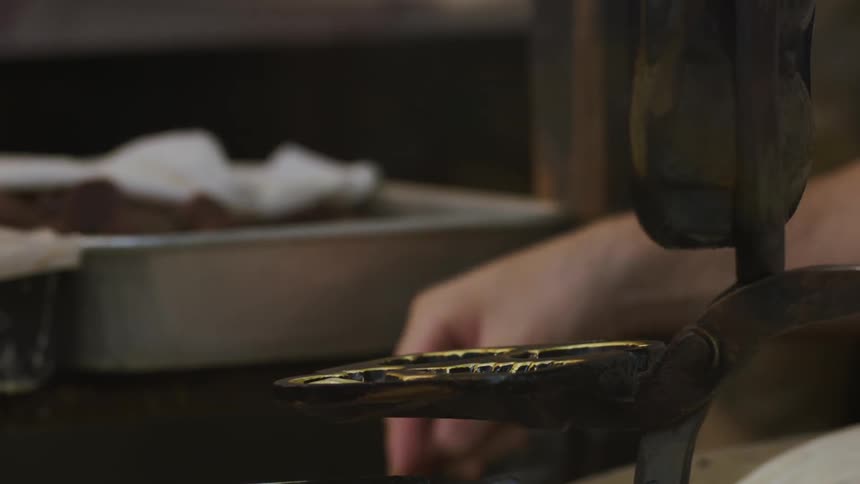 Food is prepared using a unique kitchen utensil