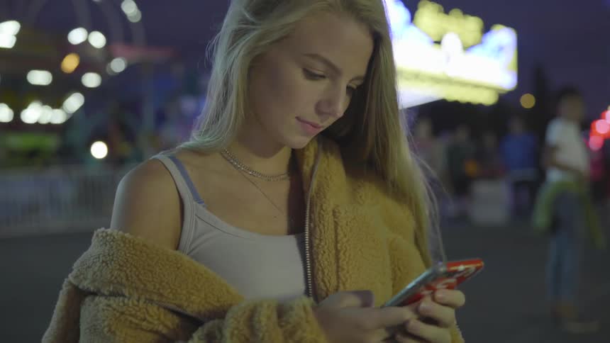 Girl looking and texting on phone