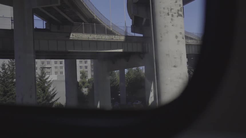 An urban neighborhood viewed through a means of transportation