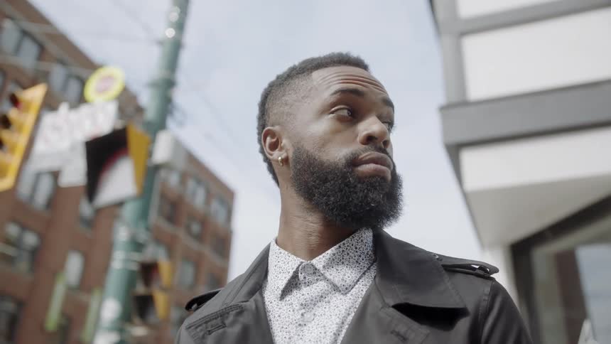 Man looks up from ground and looks around