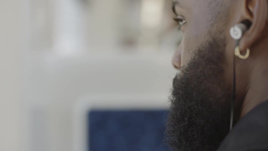African american man wearing earbuds