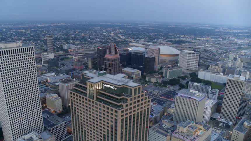 Skyscrapers tower over smaller buildings in a city center