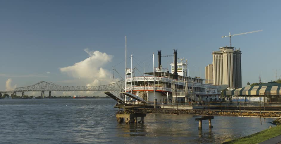 Ferry boat next to a port in a city