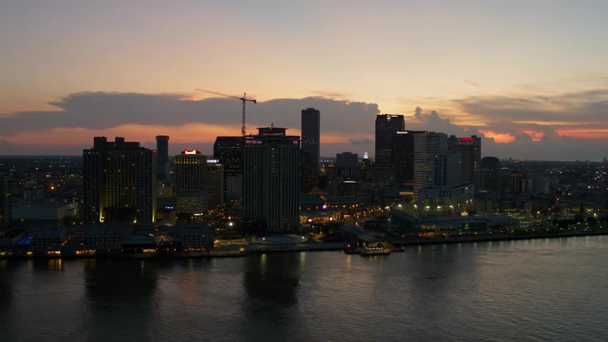 Aerial view of city skyscrapers at dusk