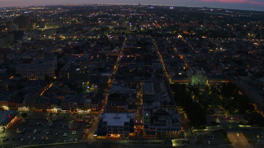 The downtown area is dark with lights on