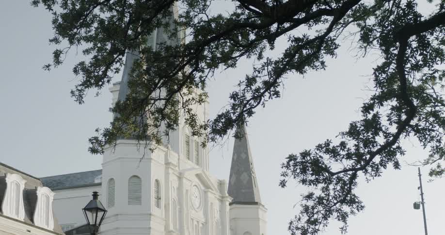 A church is displayed outside in a neighborhood