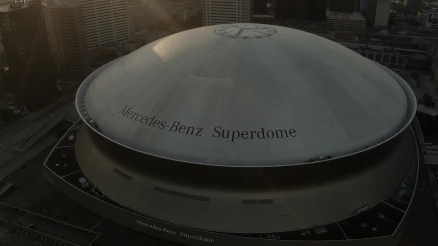Looking down at the mercedes benz superdome and then scanning the downtown area