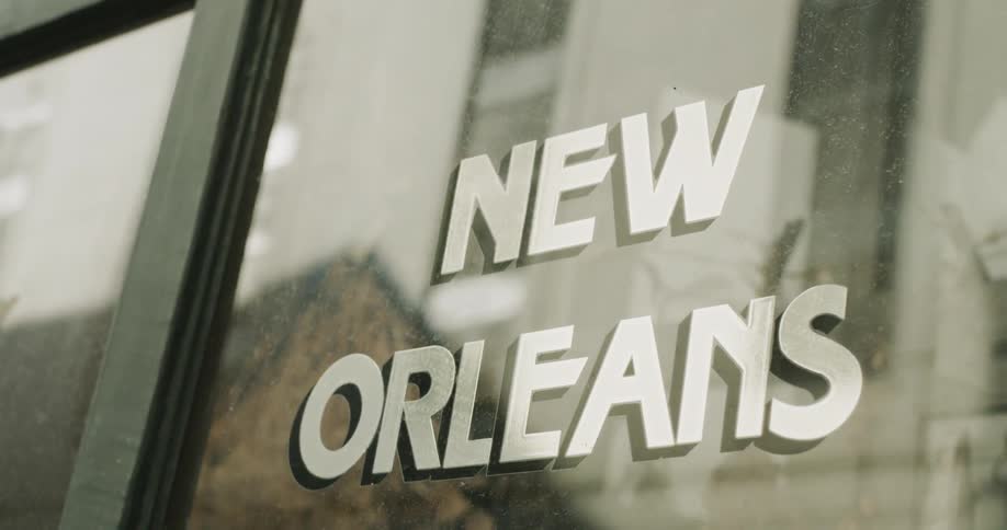Window of shop reading new orleans