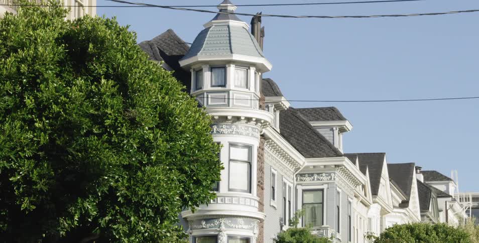 A residential neighborhood that has rows of houses