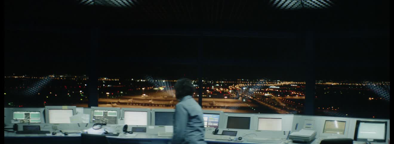 Woman works in air traffic control tower