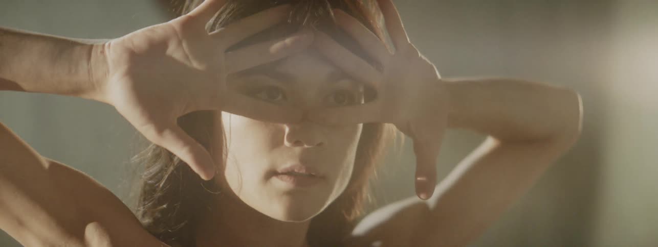 A woman dancing in a large open area
