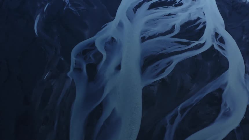 An abstract wispy looking structure against a dark background