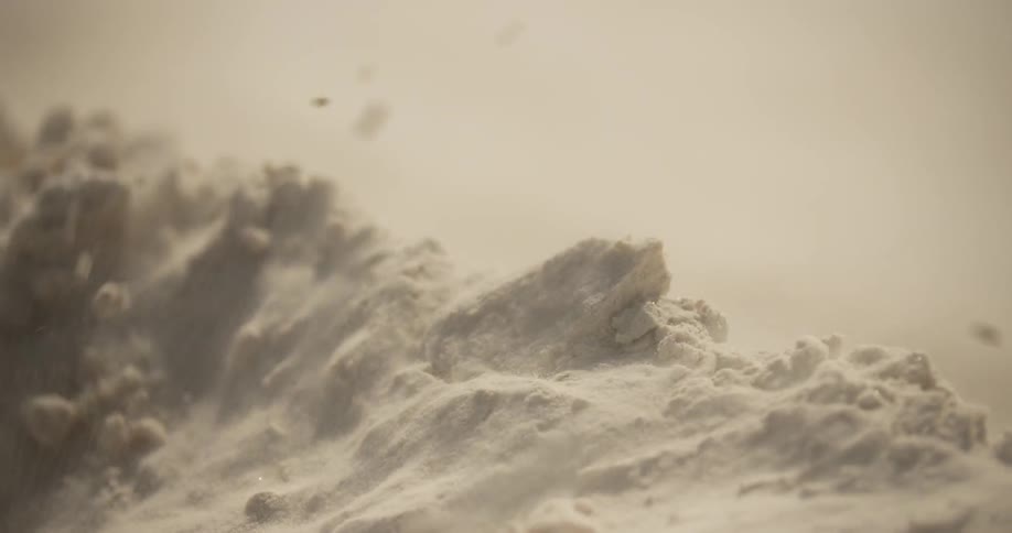 Sand is blowing from wind in a desert area