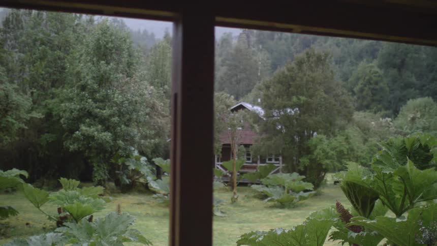 Raindrops falling from the roof in the countryside