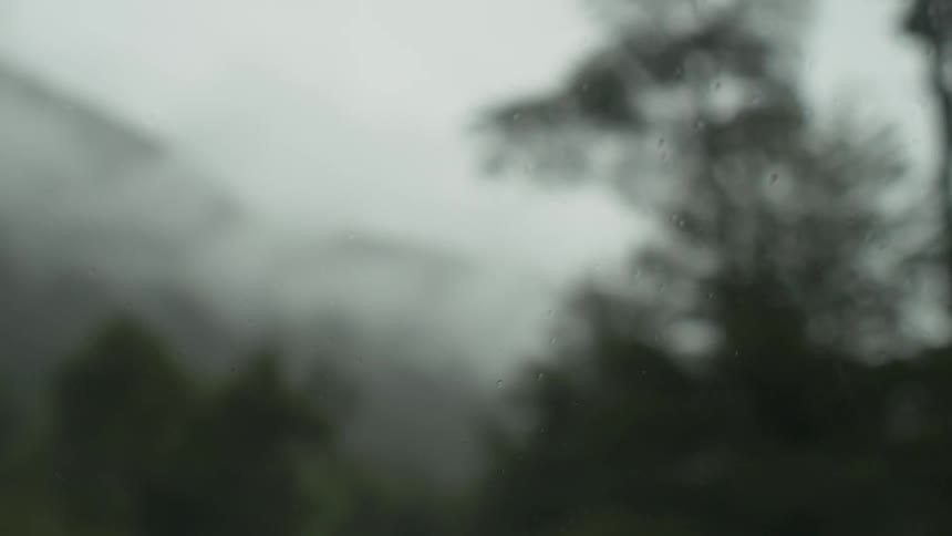 Wiper wiping off rain from a windshield