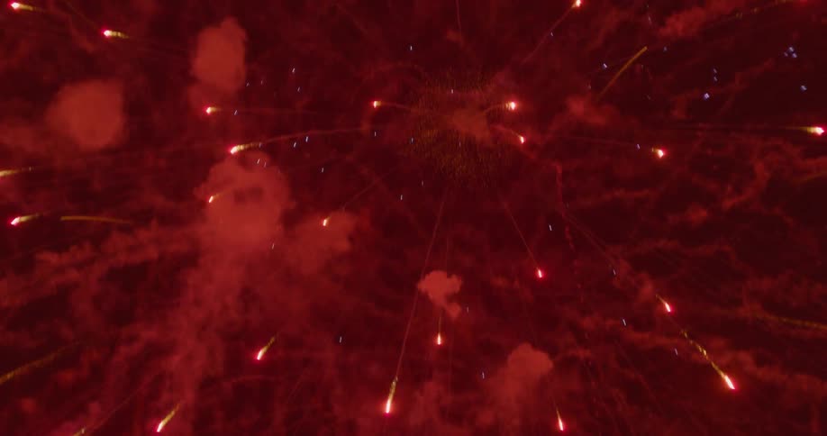 Fireworks bursting at night