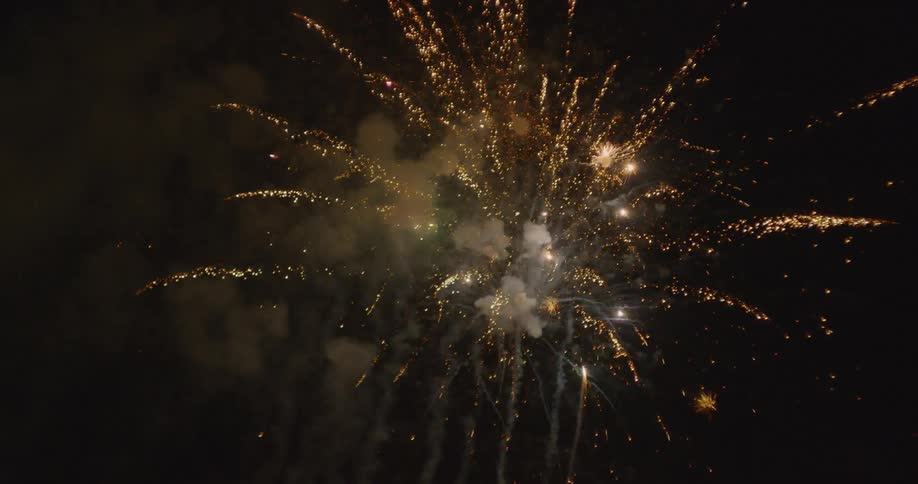 Fireworks and smoke in the night sky