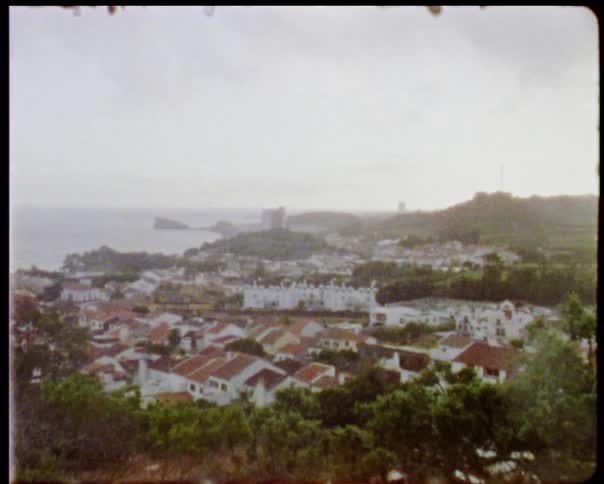 A vintage video of a city
