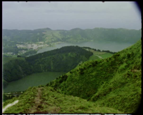 Vintage view of mountain path towards lake