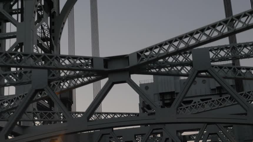 Metal bridge overpass near building